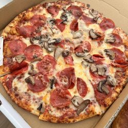 Romanos Pizza - Pepperoni and mushroom pizza