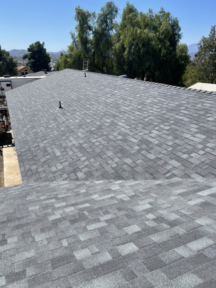 Slide of Manna Roofing Company