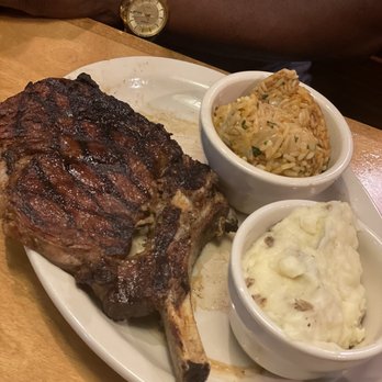 Texas Roadhouse - Supposed to be a bone in rib-eye with rice and a loaded bake potato. - American Near Me - Bowie, Maryland