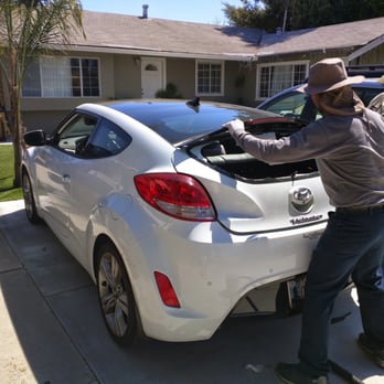 Al's Auto Glass - Al working on removing the window - Windshield Installation & Repair Near Me - Salem, Oregon Al's Auto Glass - Al working on removing the window - Windshield Installation & Repair Near Me - Salem, Oregon