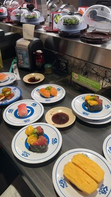 Kura Revolving Sushi Bar by null