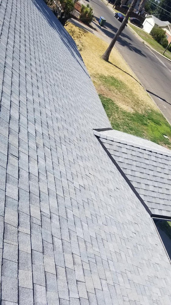 Slide of JAG Roofing