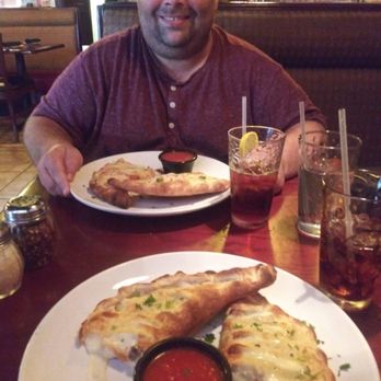 Tutto Italiano - My husband about to enjoy his Pepperoni Calzone and I'm about to enjoy my Italian Sausage Calzone ! - Pizza Near Me - Stuart, Florida Tutto Italiano - My husband about to enjoy his Pepperoni Calzone and I'm about to enjoy my Italian Sausage Calzone ! - Pizza Near Me - Stuart, Florida