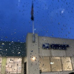 US Post Office - The post office in a nightly rain.