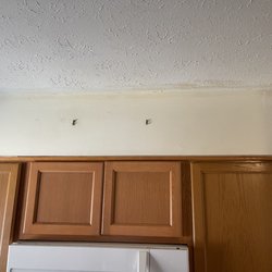 Jay's Handyman Services - Dryer vent running in soffit above cabinets