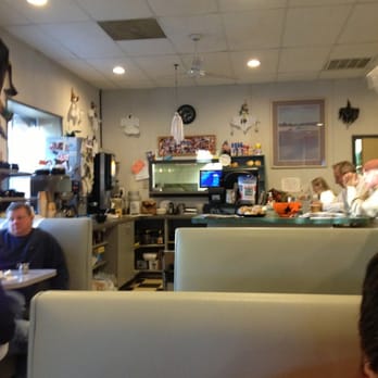 Cornerstone - a man sitting at a table in a restaurant - Diners Near Me - Congers, New York Cornerstone - a man sitting at a table in a restaurant - Diners Near Me - Congers, New York