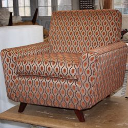 Heirloom Upholstery - I just love the fabric choice on this chair.