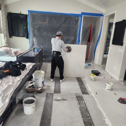 Laying 4' x 4' tile Laying 4' x 4' tile