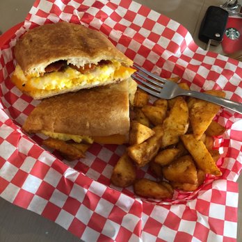 Norma's - Bacon + egg + cheese breakfast Cuban with seasoned breakfast potatoes! - Sandwiches Near Me - Plant City, Florida Norma's - Bacon + egg + cheese breakfast Cuban with seasoned breakfast potatoes! - Sandwiches Near Me - Plant City, Florida