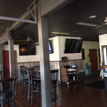 The Hangout - a man sitting at a bar - New American Near Me - Columbus, Georgia