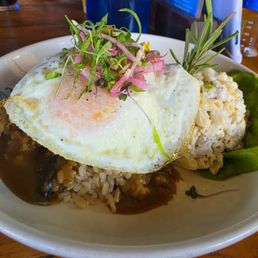 Loco Moco. They serve it with brown rice! The little pickled onions are a nice added flavor. Yum Loco Moco. They serve it with brown rice! The little pickled onions are a nice added flavor. Yum