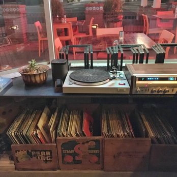 Falora - Vintage record player and an impressive vinyl collection! (They'll play your records here if you bring 'em in) - Pizza Near Me - Tucson, Arizona Falora - Vintage record player and an impressive vinyl collection! (They'll play your records here if you bring 'em in) - Pizza Near Me - Tucson, Arizona