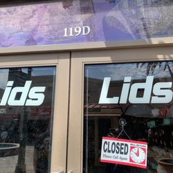 Lids - Sign saying "Be back at 10am"