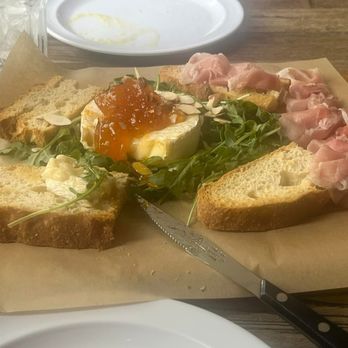 Sosta Caffe - Baked Brie with Prosciutto and pepper jelly - Italian Near Me - Pembroke Pines, Florida Sosta Caffe - Baked Brie with Prosciutto and pepper jelly - Italian Near Me - Pembroke Pines, Florida