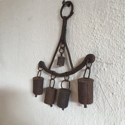 Café Svabesholm - Walls covered in art, old horse related tools and accessories.