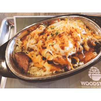 Woodstone Eatery - Cheesy bake BBQ Pork on rice topped with a poached egg. - Asian Fusion Near Me - Markham, Ontario