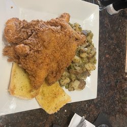 Lagniappe Steak & Seafood - This is too fried pork chops with smothered potatoes. They were tender, but a little heavily battered in my opinion.!