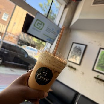 El Cafecito - Latte de Nuez: Homemade toasted pecan syrup topped with maple cold foam (iced) - Coffee & Tea Near Me - Wilson, North Carolina El Cafecito - Latte de Nuez: Homemade toasted pecan syrup topped with maple cold foam (iced) - Coffee & Tea Near Me - Wilson, North Carolina