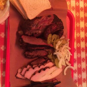 Black's Barbecue Lockhart - 1 lb beef rib, 1/2 lb lean brisket, 1/2 lb smoked turkey, and a link of original sausage. - Barbeque Near Me - Lockhart, Texas Black's Barbecue Lockhart - 1 lb beef rib, 1/2 lb lean brisket, 1/2 lb smoked turkey, and a link of original sausage. - Barbeque Near Me - Lockhart, Texas