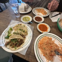 Shrimp and al pastor tacos, rice and chips/salsa Shrimp and al pastor tacos, rice and chips/salsa