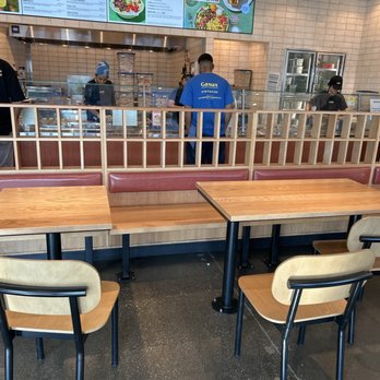 CAVA - 2 workers and a line to the back door. - Mediterranean Near Me - Carson, California