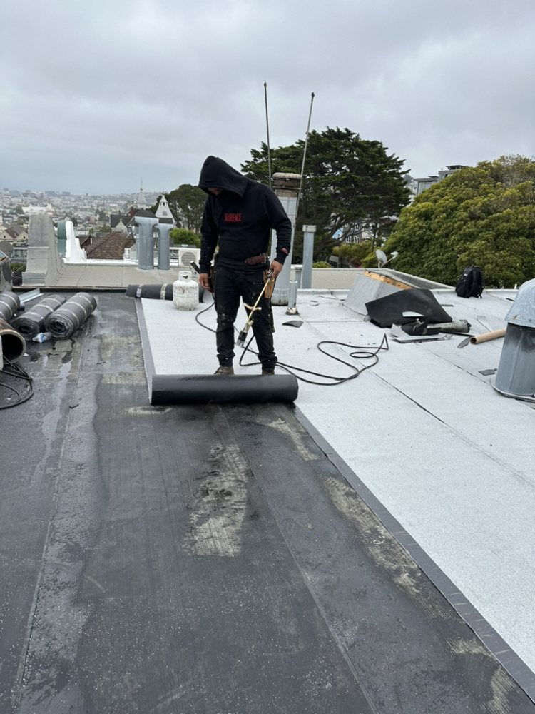 Slide of Rene’s Roofing