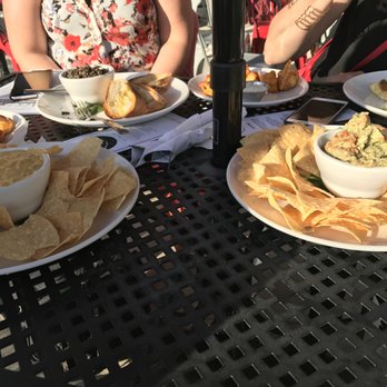 Beerline Cafe - Tapenade on the back, Nacho Cheese and chips on the left, and Avocado Hummus on the right. - Vegetarian Near Me - Milwaukee, Wisconsin