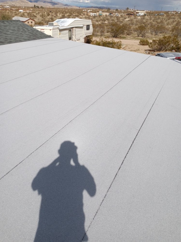 Slide of Moses Roofing