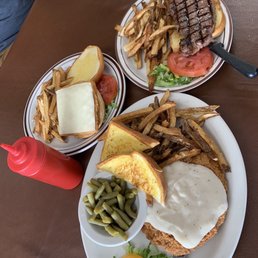 two plates of food on a table two plates of food on a table