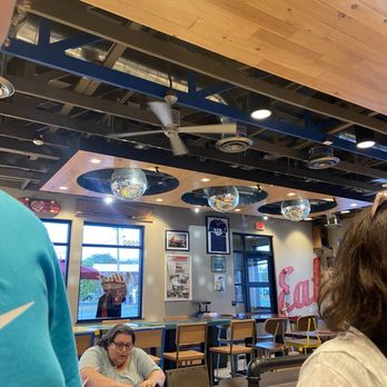 Raising Cane's Chicken Fingers - Never seen disco balls in a fast food chain dining area. They played music to match it! - Fast Food Near Me - Mentor, Ohio