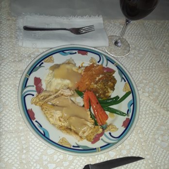 Fresco - a plate of food and a glass of wine - Pizza Near Me - Cranston, Rhode Island