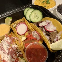 Pork, Chicken and Beef Tacos with rice and black beans. Pork, Chicken and Beef Tacos with rice and black beans.