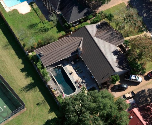 Slide of Green Knight Metal Roofing