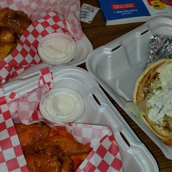 Boeshreen - two takeout containers with chicken wings and a hot dog - Mediterranean Near Me - Columbia, South Carolina