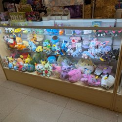 Fragmented Nostalgia - Select Collectable Pokemon Plush on display