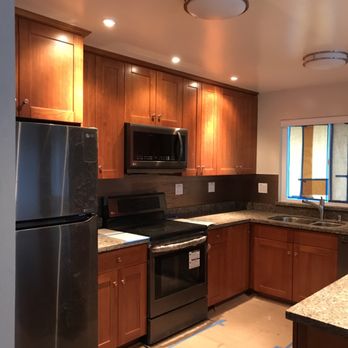 Rem Pro Remodeling - After - a new 2017 Kitchen, cherry cabinets, granite counter tops, copper backsplash - General Contractors Near Me - San Carlos, California