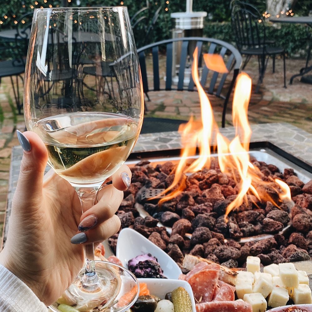 Pourr Decisions wine lounge - Patio area + fire pit - Wine Bars Near Me - Modesto, California Pourr Decisions wine lounge - Patio area + fire pit - Wine Bars Near Me - Modesto, California