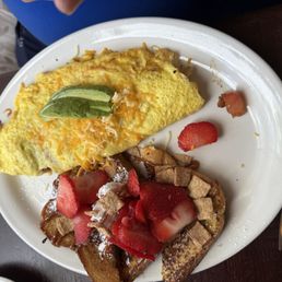 Churro French Toast and house omelette Churro French Toast and house omelette