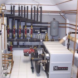 Superior Comfort Heating and Air Conditioning - Boiler and piping in commercial building