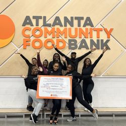 Stick Shift Fitness - Stick Shift Fitness Volunteers at Food Bank