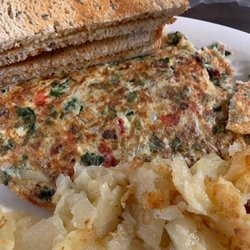 Home Style Family Restaurant - Bacon cheese omelette with onion and tomato, hashbrowns, rye toast