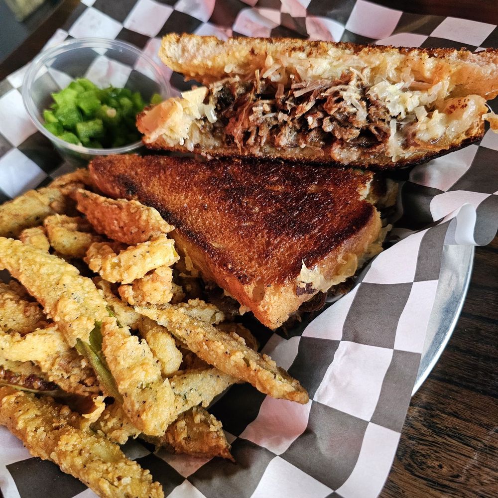 Smoke Bourbon and BBQ - Brisket Rueben with a side of fried Okra and Banana Peppers - Cocktail Bars Near Me - Columbus, Georgia Smoke Bourbon and BBQ - Brisket Rueben with a side of fried Okra and Banana Peppers - Cocktail Bars Near Me - Columbus, Georgia
