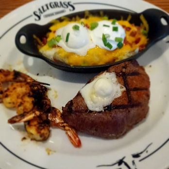 Saltgrass Steak House - Surf & turf special with loaded mashed potatoes and the shrimp grilled - Seafood Near Me - Metairie, Louisiana Saltgrass Steak House - Surf & turf special with loaded mashed potatoes and the shrimp grilled - Seafood Near Me - Metairie, Louisiana