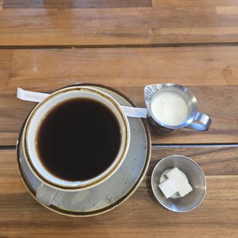 Let's Do Brunch - Coffee with cream and sugar. - Breakfast & Brunch Near Me - Queens, New York