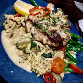 White Tarpon - Seared Grouper with zucchini, olive, artichoke orzo pasta - Cocktail Bars Near Me - Key West, Florida
