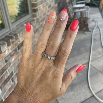 The Nail Boutique - summer time nails! i'm a neutral girl, but i wanted a few weeks with a bright color look at those beautiful flowers - Nail Salons Near Me - Overland Park, Kansas
