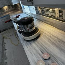 Before picture of a countertop that had alot of scratches and etching