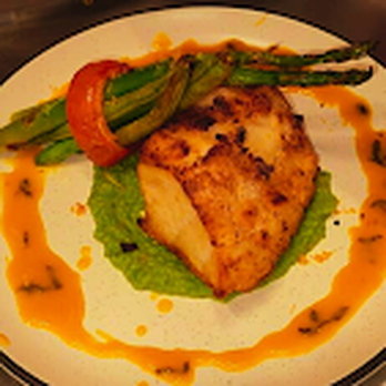Nowhere Lounge - a plate of fish and asparagus - Lounges Near Me - McAllen, Texas