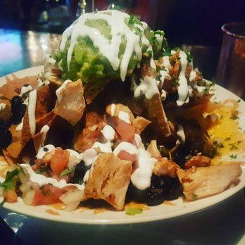 Morrison - Chicken nachos. That is a whole lot of guacamole. - Gastropubs Near Me - Los Angeles, California Morrison - Chicken nachos. That is a whole lot of guacamole. - Gastropubs Near Me - Los Angeles, California