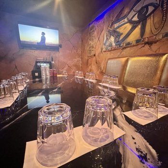 Rosen Club - a long table with wine glasses on it - Karaoke Near Me - Las Vegas, Nevada Rosen Club - a long table with wine glasses on it - Karaoke Near Me - Las Vegas, Nevada